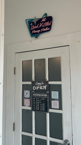 Tat’s Quick ‘N Slick Piercing Parlour tattoo shop in Portsmouth, New Hampshire