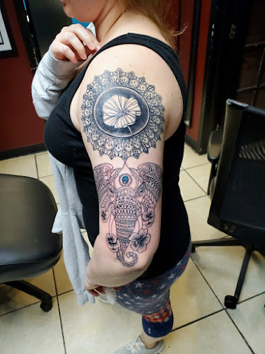 Romantic Torture Tattoo tattoo shop in Raleigh, North Carolina