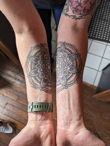 Axe of Kindness Tattoo tattoo shop in Rochester, New York