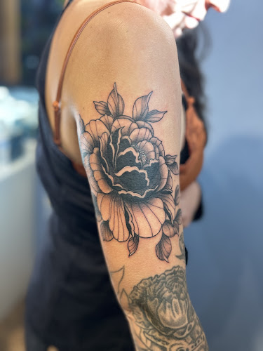 Prismatic Tattoo Studio tattoo shop in Rothschild, Wisconsin