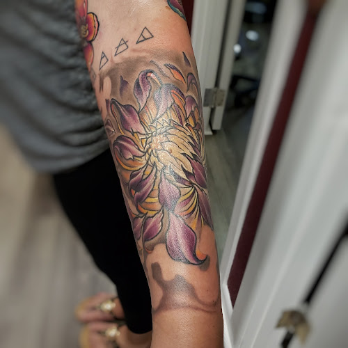 Over Omega Tattooing tattoo shop in Seminole, Florida