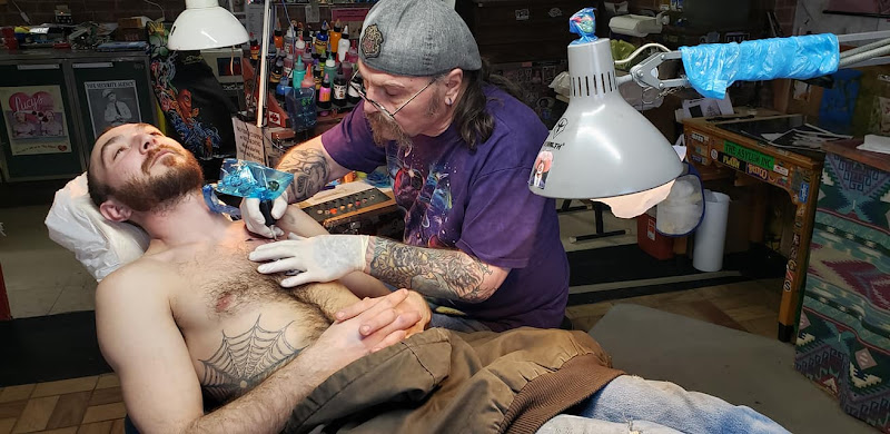 Octopus Ink Professional Tattoo & Piercing tattoo shop in Sigourney, Iowa