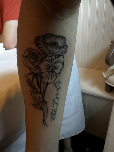 Promised Land Tattoo and Piercing tattoo shop in St. Louis, Missouri