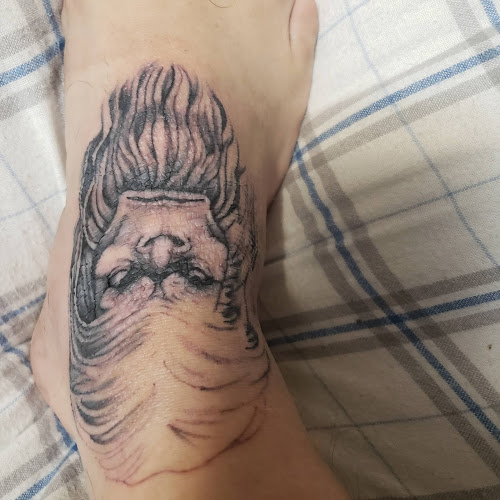 Blue Lotus Tattoo & The Piercing Lounge tattoo shop in Sun Prairie, Wisconsin