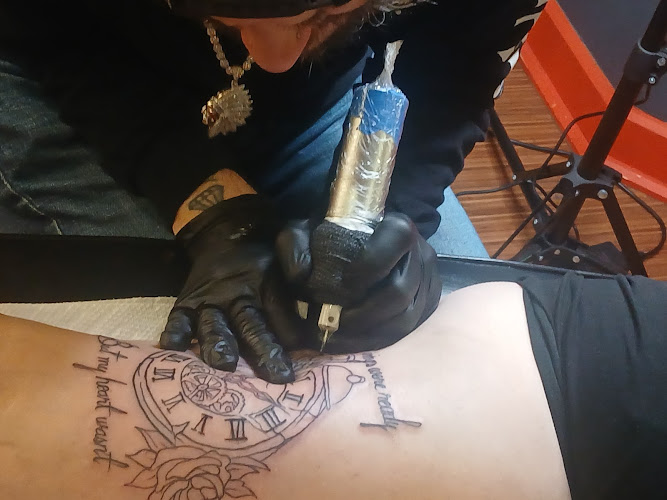 Twisted Images Tattoo and Piercing Studio tattoo shop in Syracuse, New York