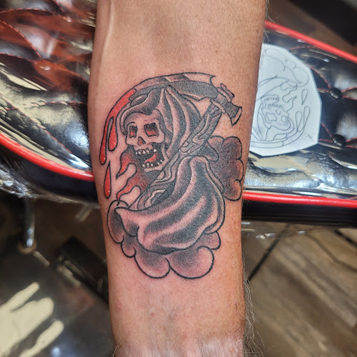 White Lotus Tattoos on 9LLC tattoo shop in Toms River, New Jersey