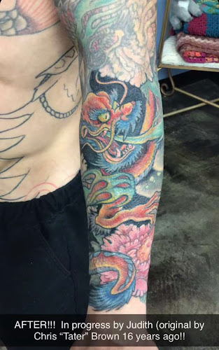 Looking Glass Tattoo & Gallery tattoo shop in Topeka, Kansas