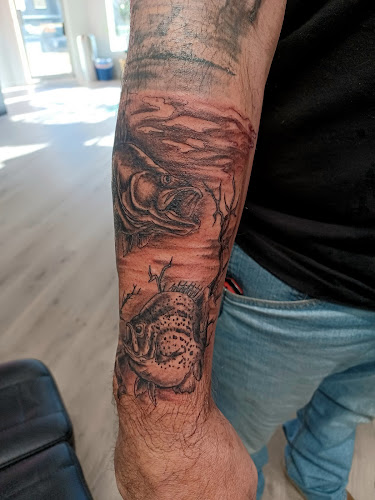 Pigment Tattoo Lounge & Gallery tattoo shop in Topeka, Kansas