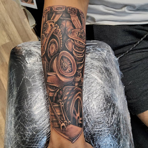 Papaz Tattoo Studio at 1903 Saloon tattoo shop in Trevor, Wisconsin