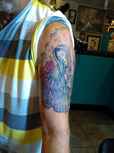 Enigma Tattoos & Body Piercings tattoo shop in University City, Missouri