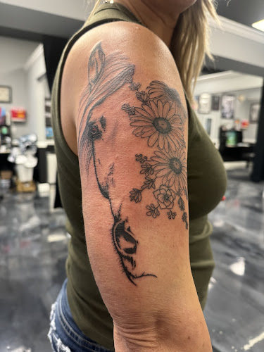 Ringo Pinion Tattoo and Pinup Studio tattoo shop in Urbandale, Iowa