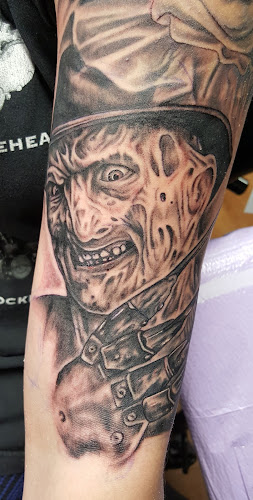 MOONSHINE INK TATTOO CO. tattoo shop in Webster, Massachusetts