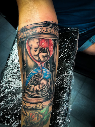 Status Tattoo tattoo shop in West Union, Ohio