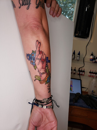 Curated Art Tattoo tattoo shop in Windsor, New York