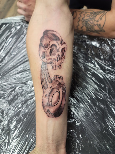 Hustle House Tattoo & Piercing tattoo shop in Zimmerman, Minnesota